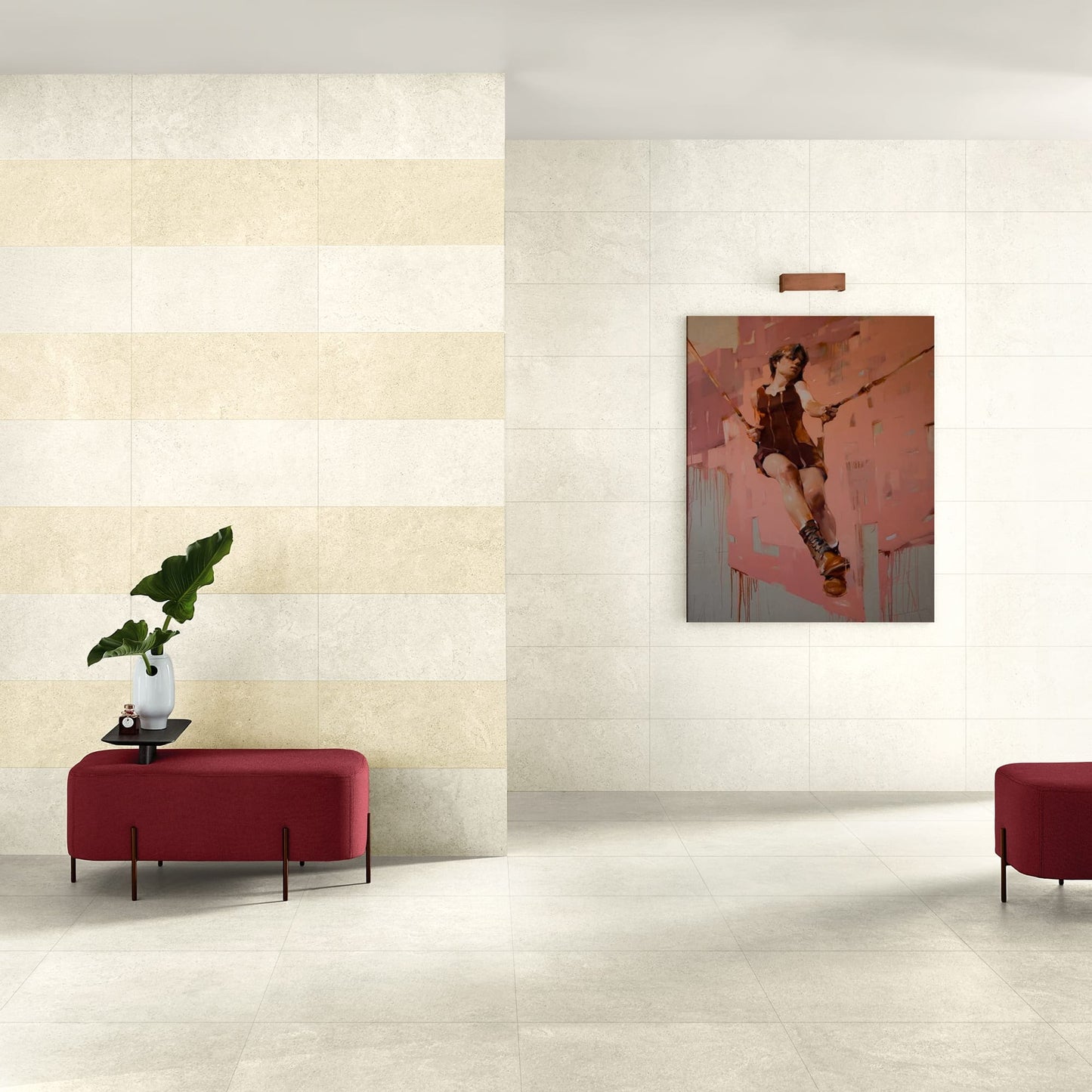 Nest White 610x610mm porcelain tiles covering a contemporary lobby feature wall with striped beige tones, complemented by a red upholstered bench and modern artwork.