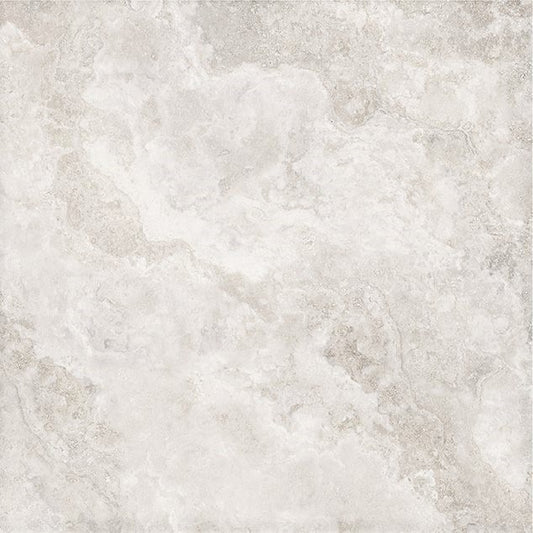 Close-up of New Travertino Ivory Matt Rect 600x600mm tile showing soft ivory tones with natural travertine-inspired cloudy veining and matte finish.