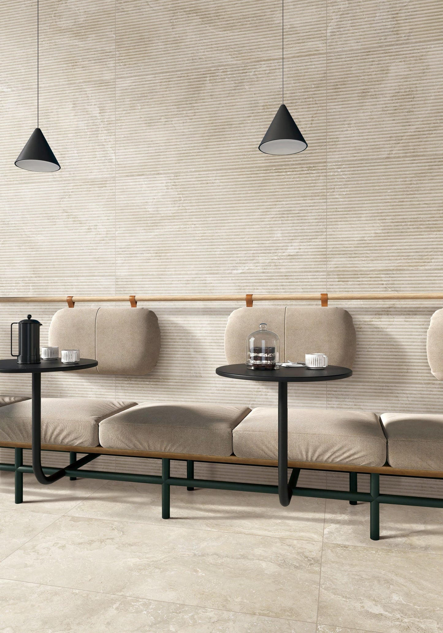 Norcia Travertine Beige 600x1200mm tiles covering a ribbed feature wall and floor in a modern cafe seating area with pendant lights and modular bench seating.