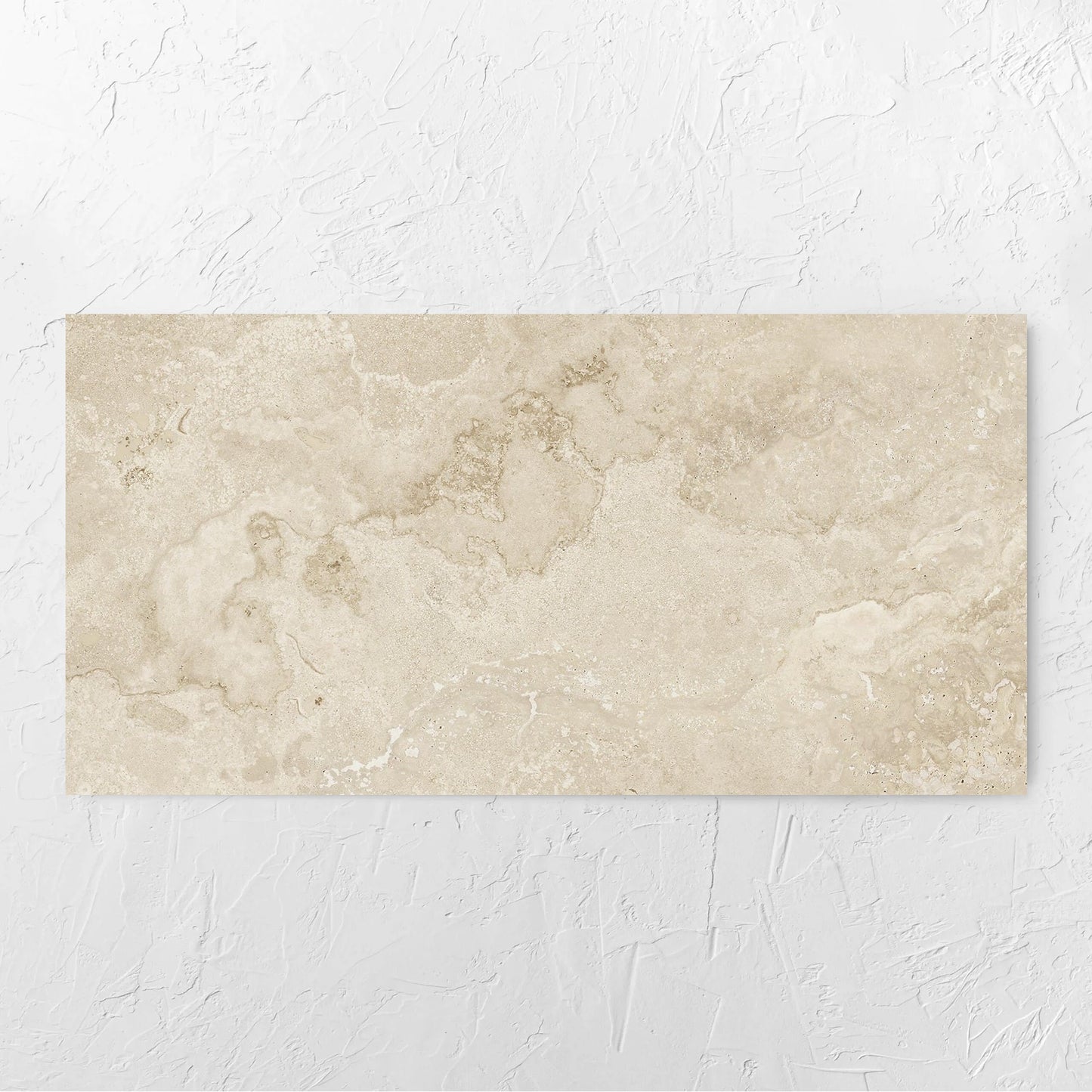 Norcia Travertine Beige 600x1200mm tile laid flat on a white rendered wall, showing the tile surface