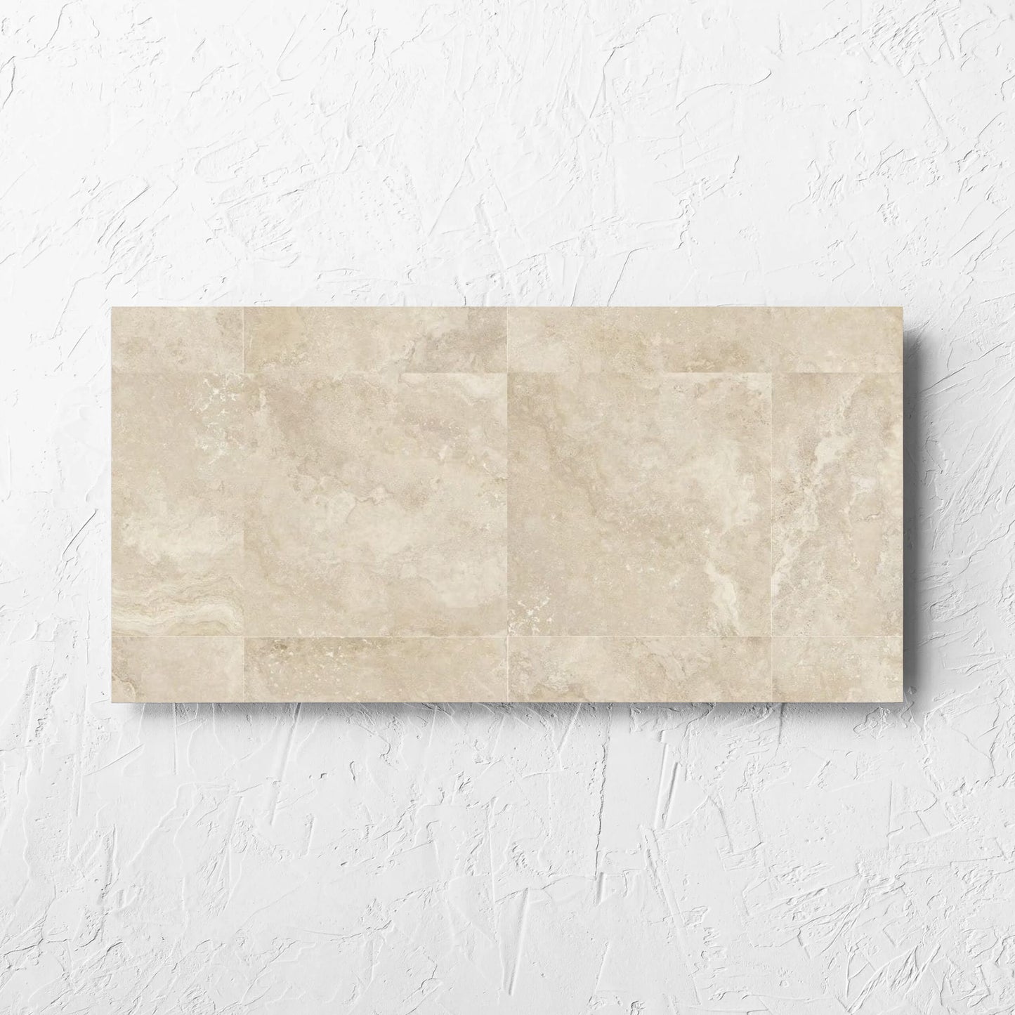 Norcia Travertine Beige Decor 300x600mm tile laid flat on a white rendered wall, showing the tile surface