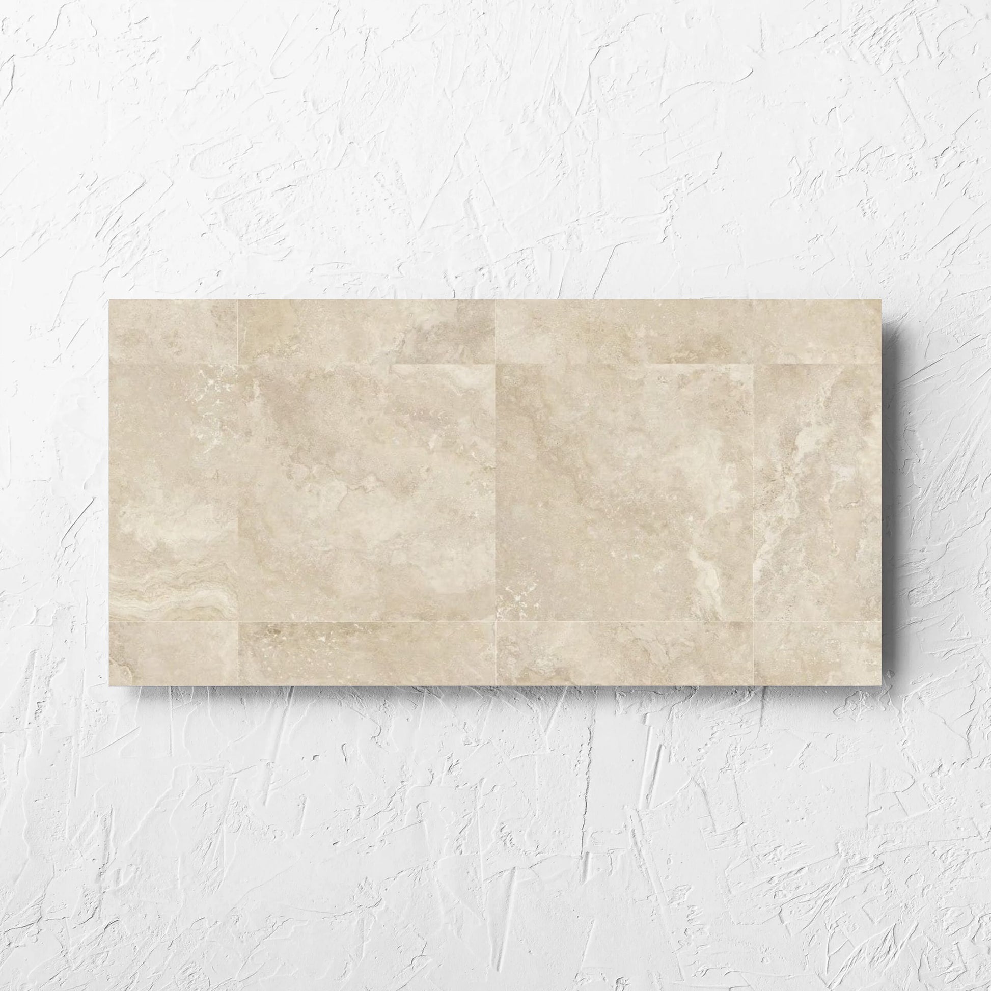 Norcia Travertine Beige Decor 300x600mm tile laid flat on a white rendered wall, showing the tile surface