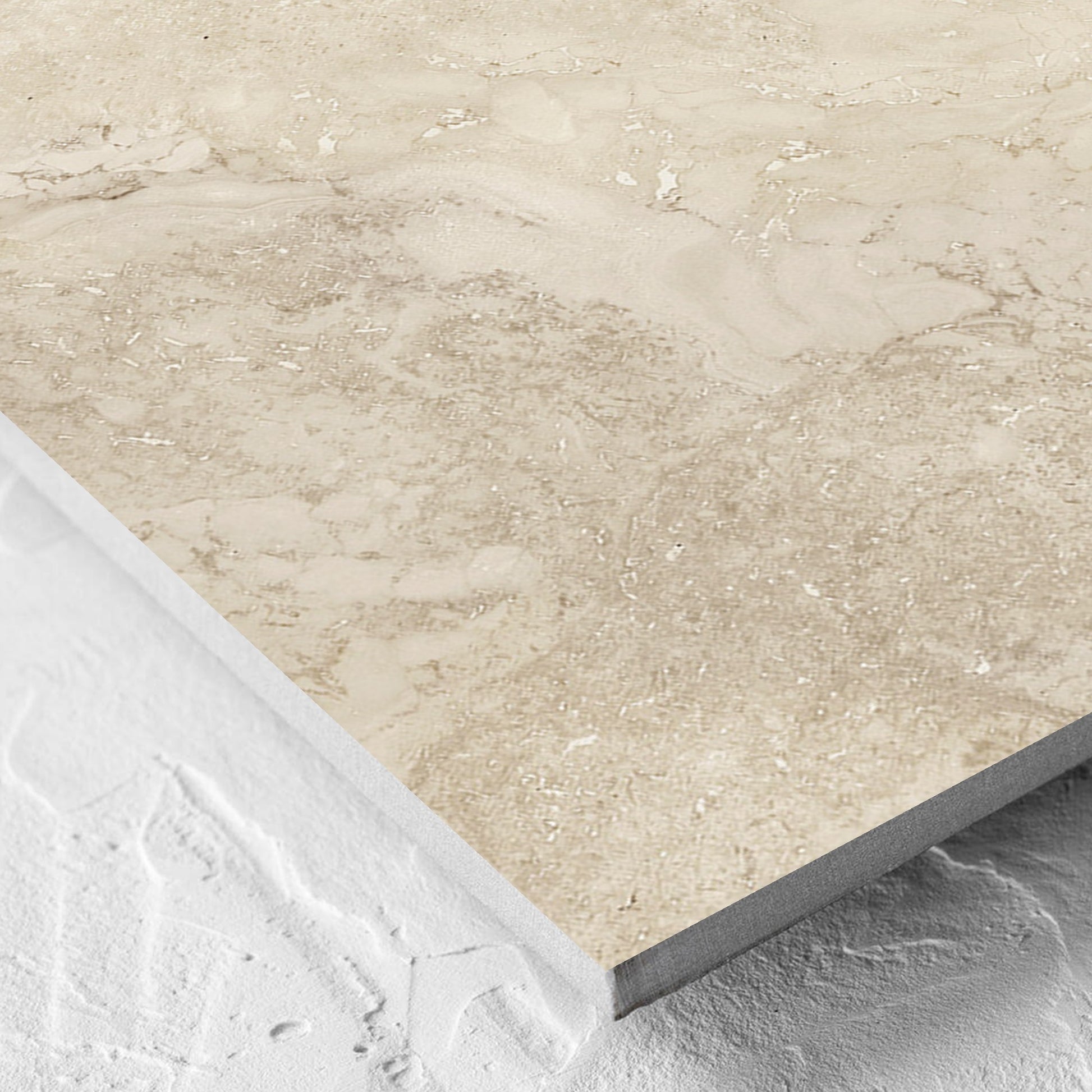 Corner close-up of the Norcia Travertine Beige Honed 600x600mm tile showing the tile surface and the edge profile