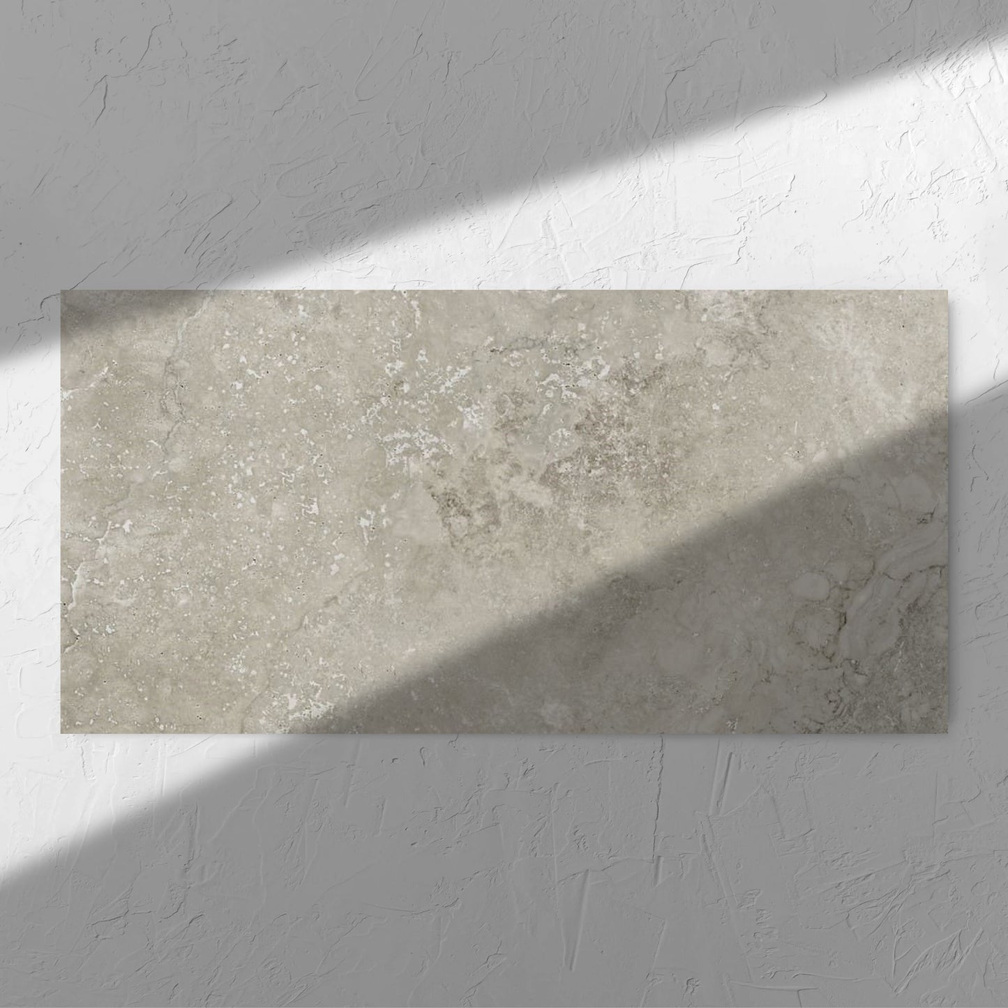 Norcia Travertine Grey 600x1200mm tile in soft natural window light, showing the tile surface
