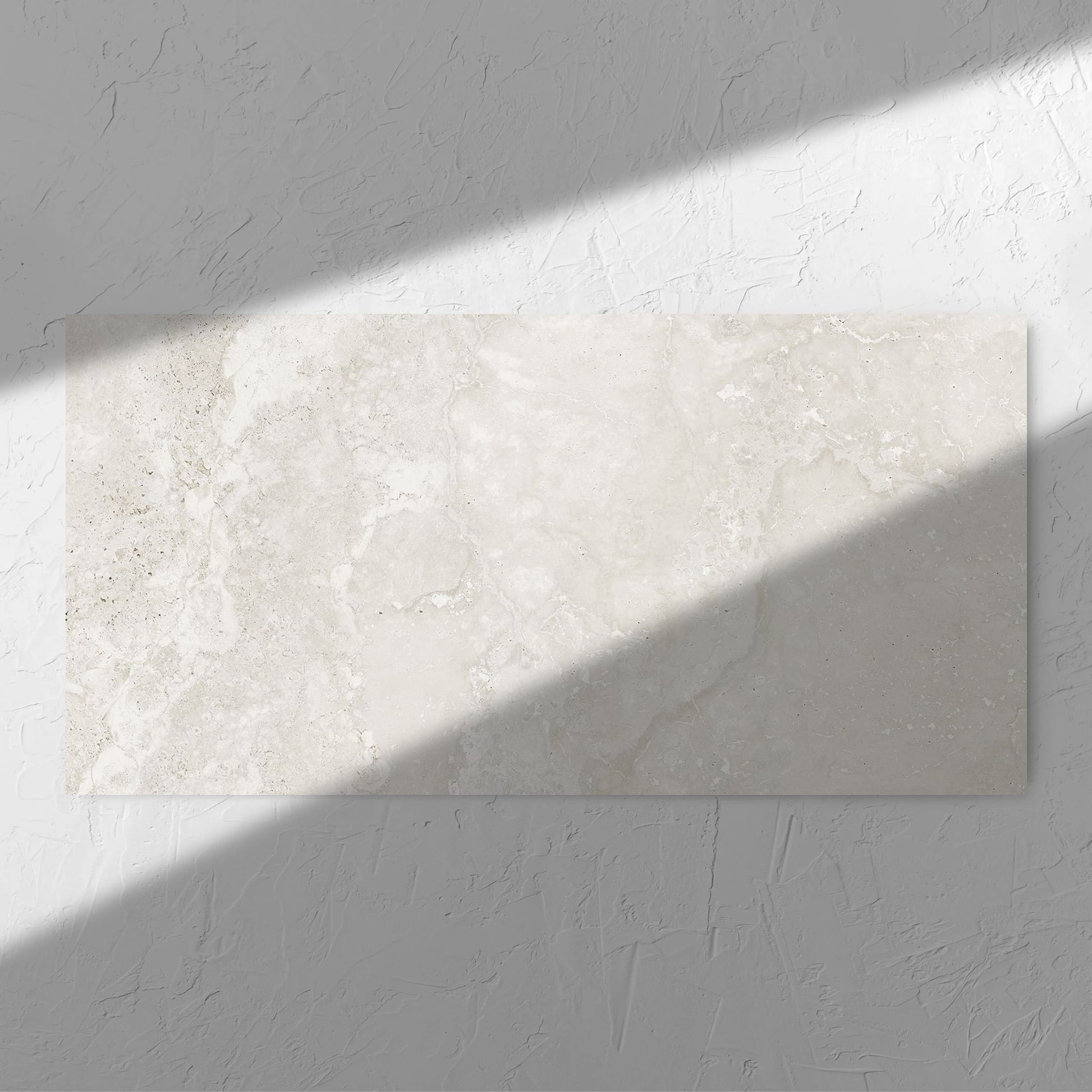 Norcia Travertine Light Bamboo Feature 600x1200mm tile in soft natural window light, showing the tile surface
