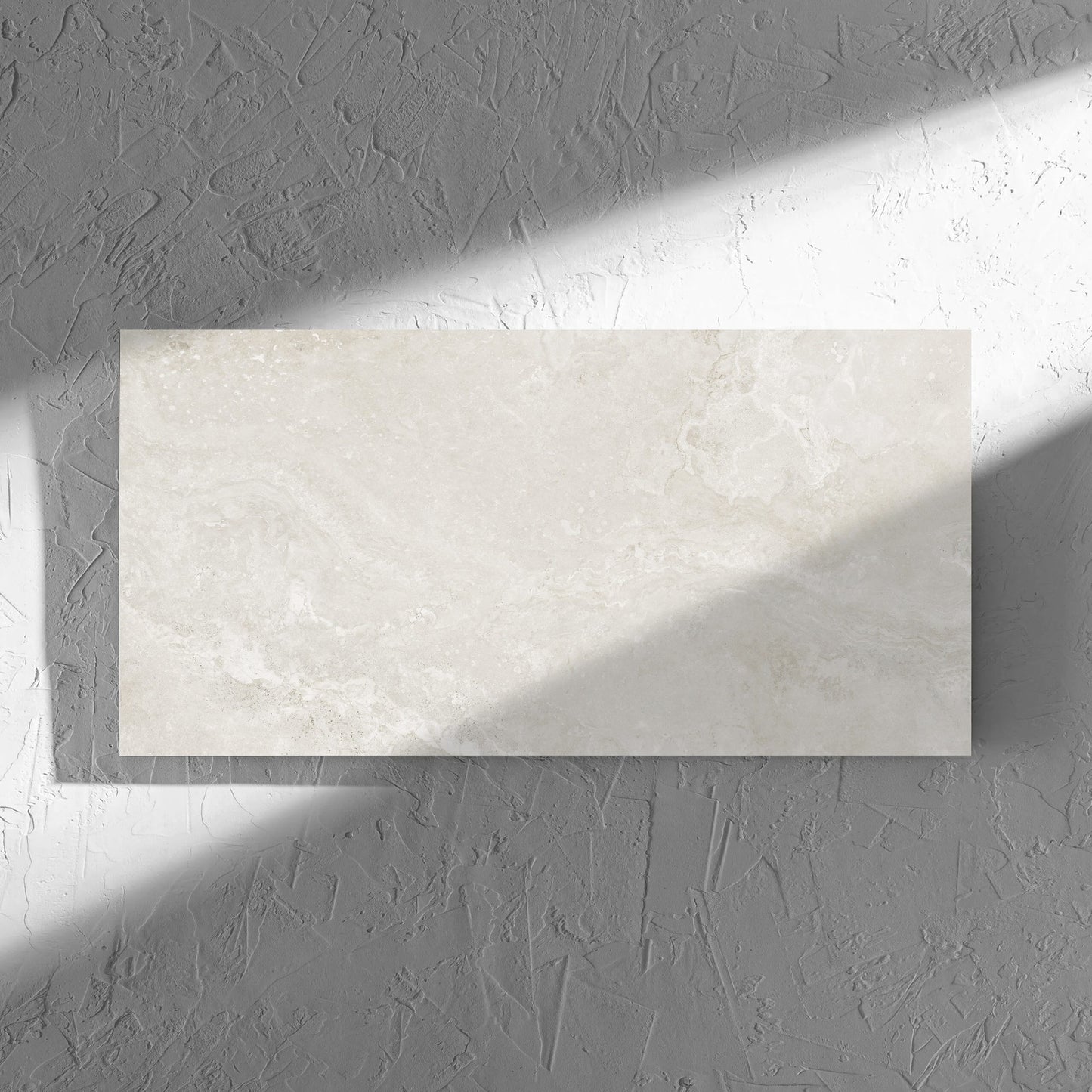 Norcia Travertine Light Decor 300x600mm tile in soft natural window light, showing the tile surface