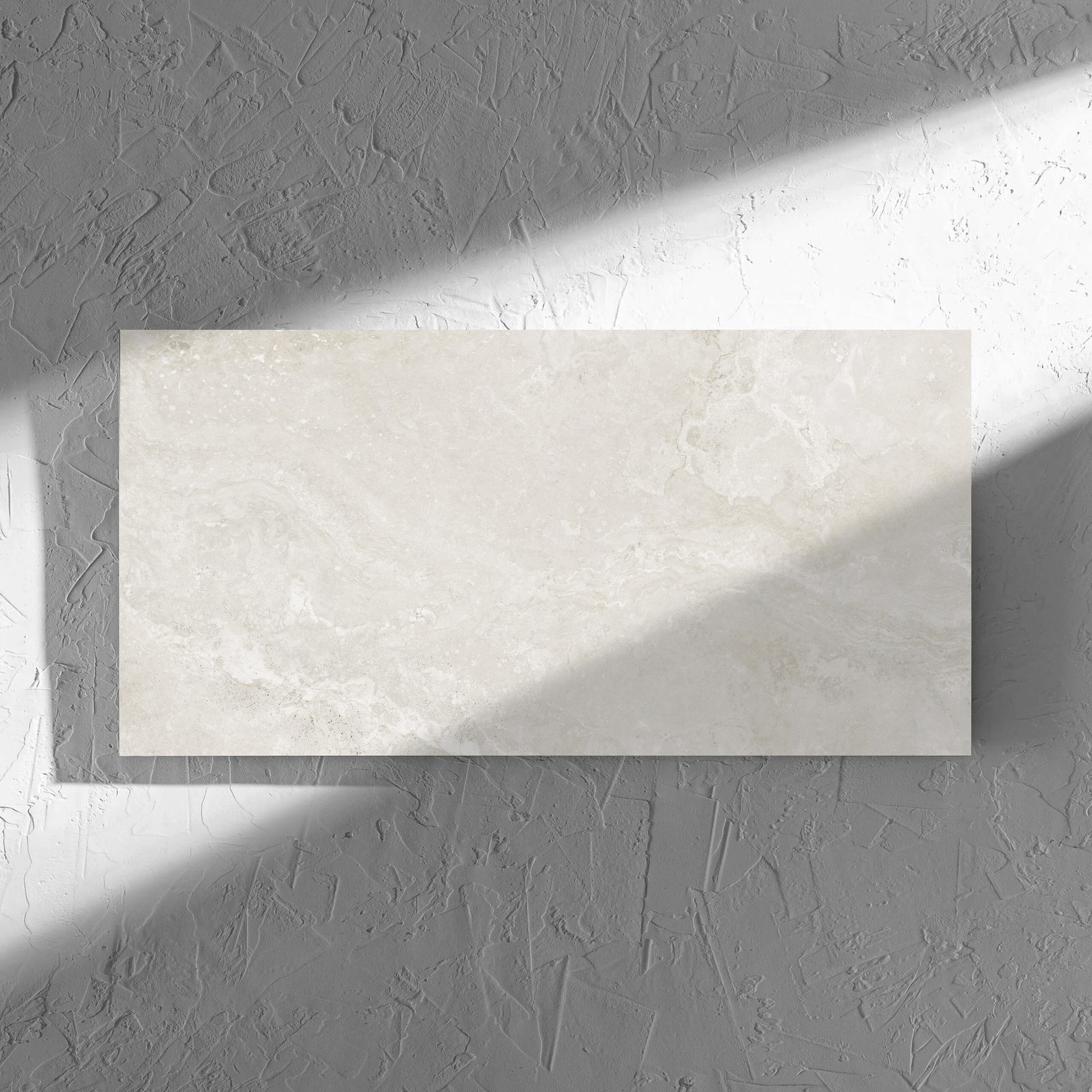 Norcia Travertine Light Decor 300x600mm tile in soft natural window light, showing the tile surface