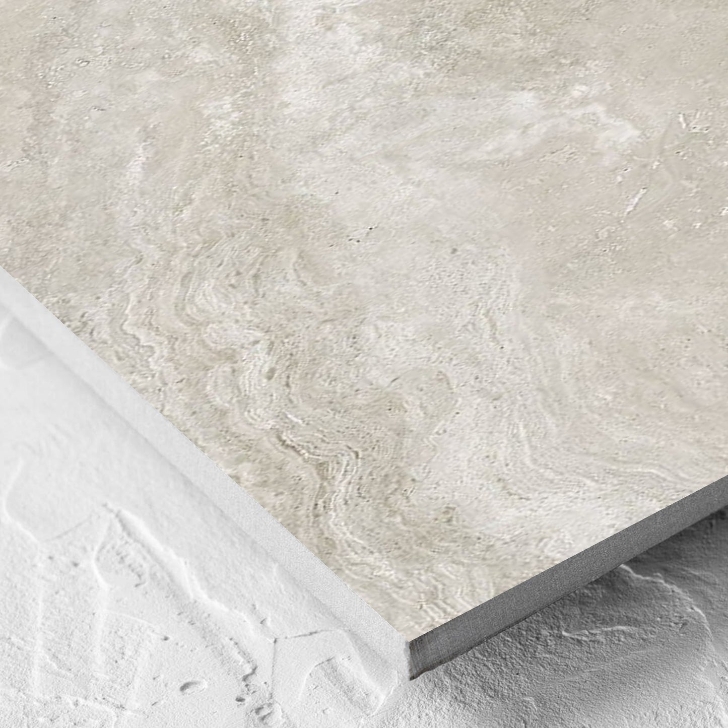 Corner close-up of the Norcia Travertine Silver 300x600mm tile showing the tile surface and the edge profile