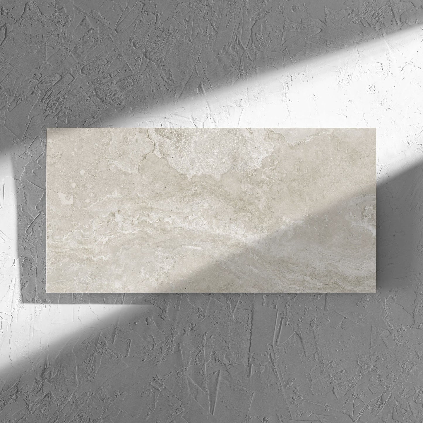 Norcia Travertine Silver 300x600mm tile in soft natural window light, showing the tile surface