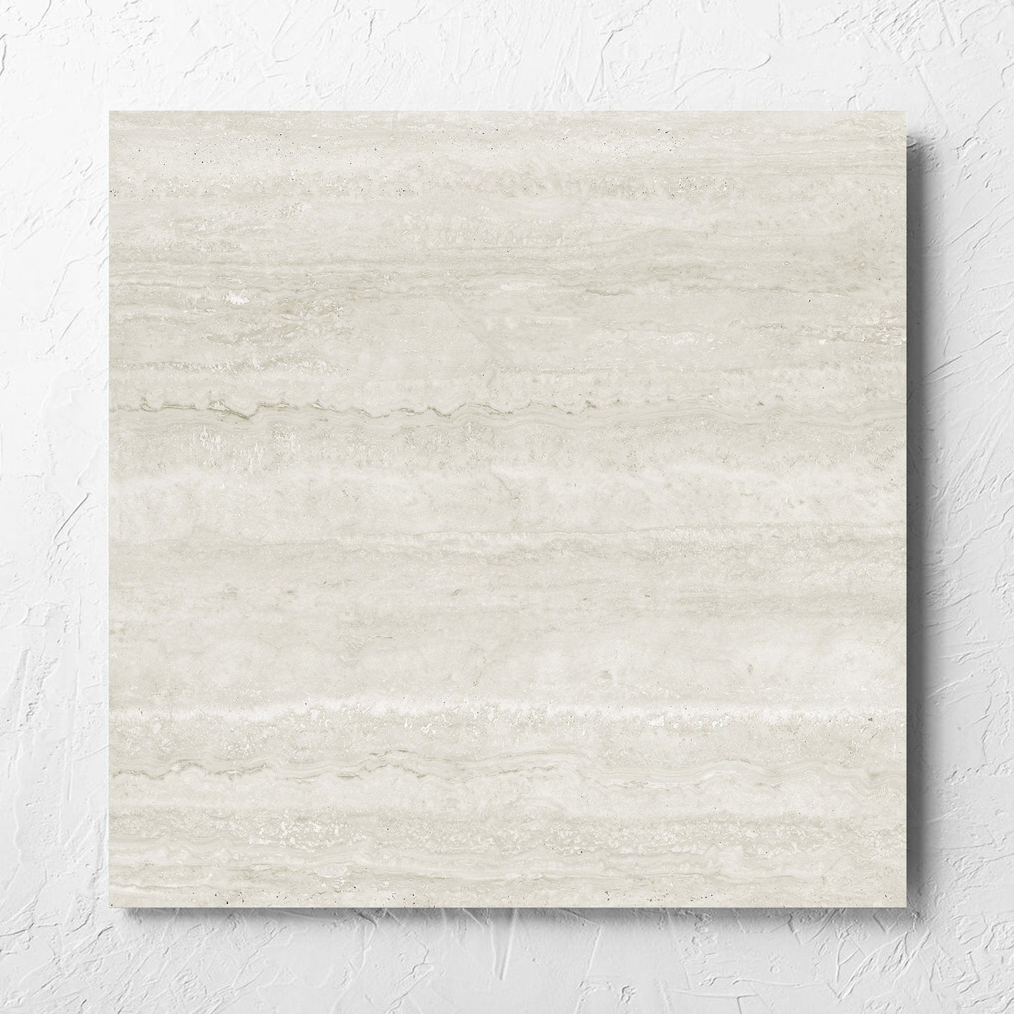 Norcia Vein Cut Light 600x600mm tile laid flat on a white rendered wall, showing the light grey matt surface
