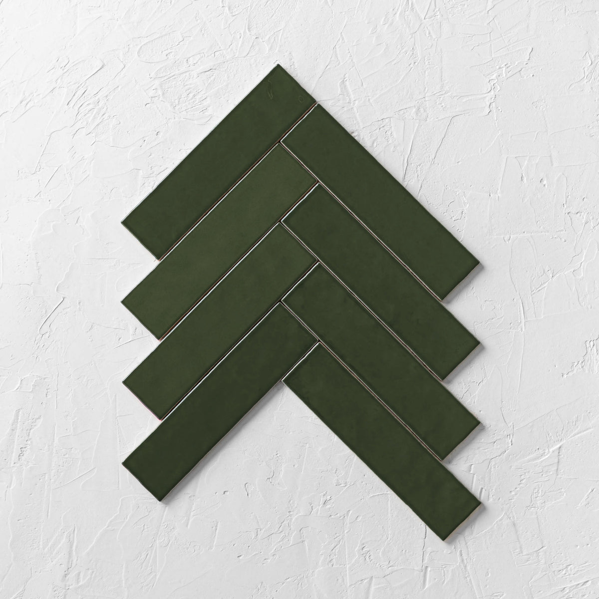 Casablanca Olive Gloss tiles in a herringbone layout