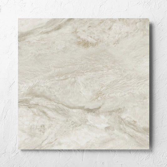 Onyx Beige Polished 600x600mm tile laid flat on a white rendered wall, showing the matt surface