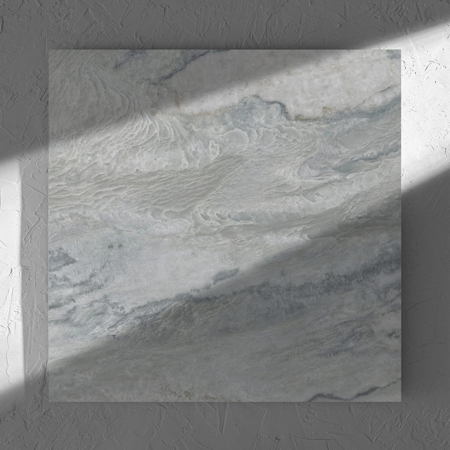 Onyx Grey Matt 600x600mm tile in soft natural window light, showing the matt surface