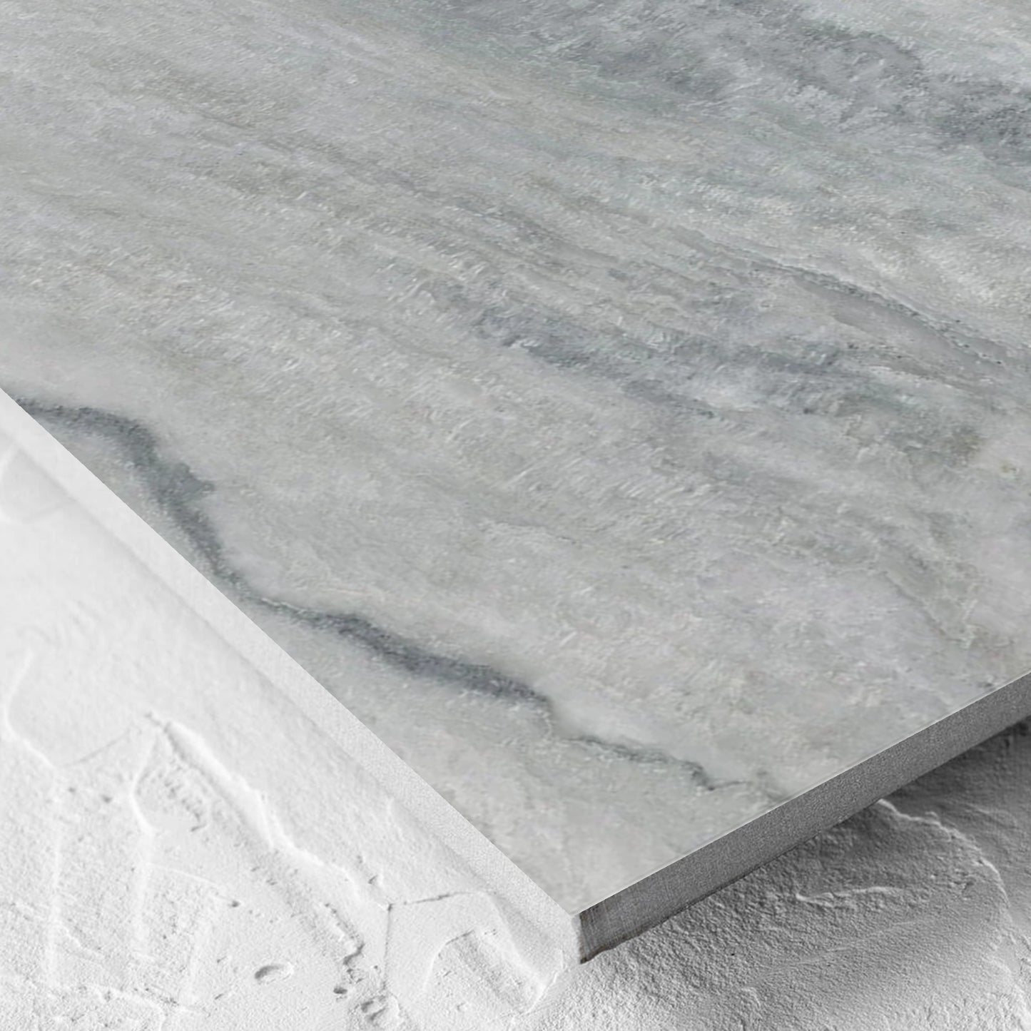Corner close-up of the Onyx Grey Polished 600x600mm tile showing the matt surface and the edge profile