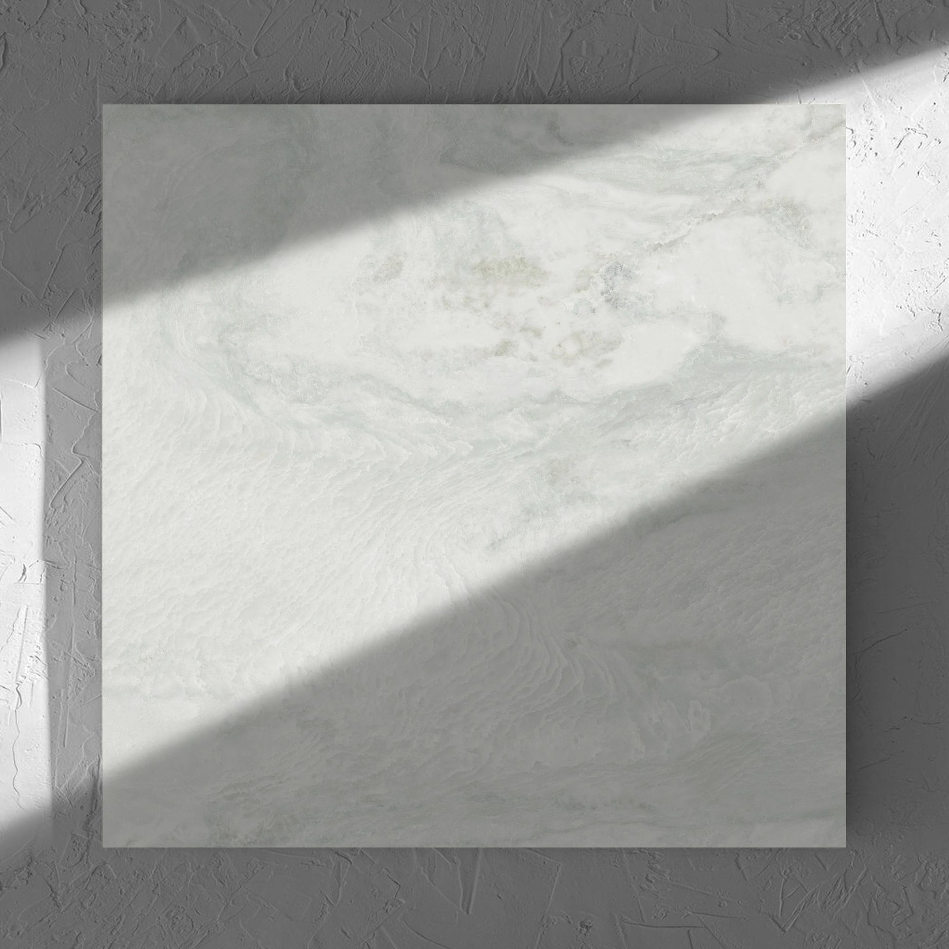 Onyx White Polished 600x600mm tile in soft natural window light, showing the matt surface