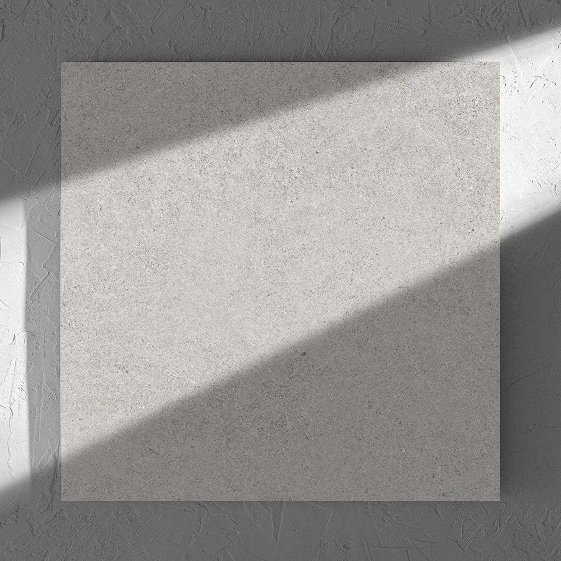 Organic Pietra Lavica Glacier Lappato 600x600mm tile in soft natural window light, showing the tile surface