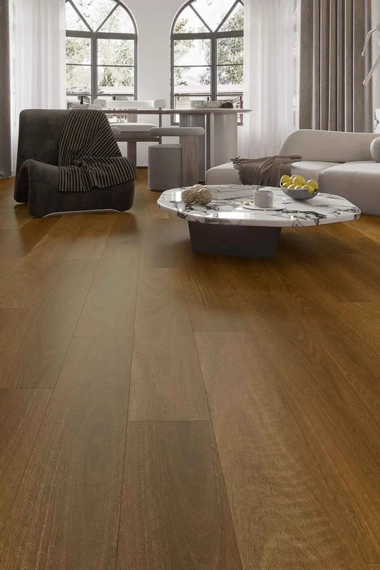 Pacific Spotted Gum Elegant SPC Hybrid 9.5mm Flooring 7.5+2mm installed in a bright modern living room with a marble coffee table and arched windows.