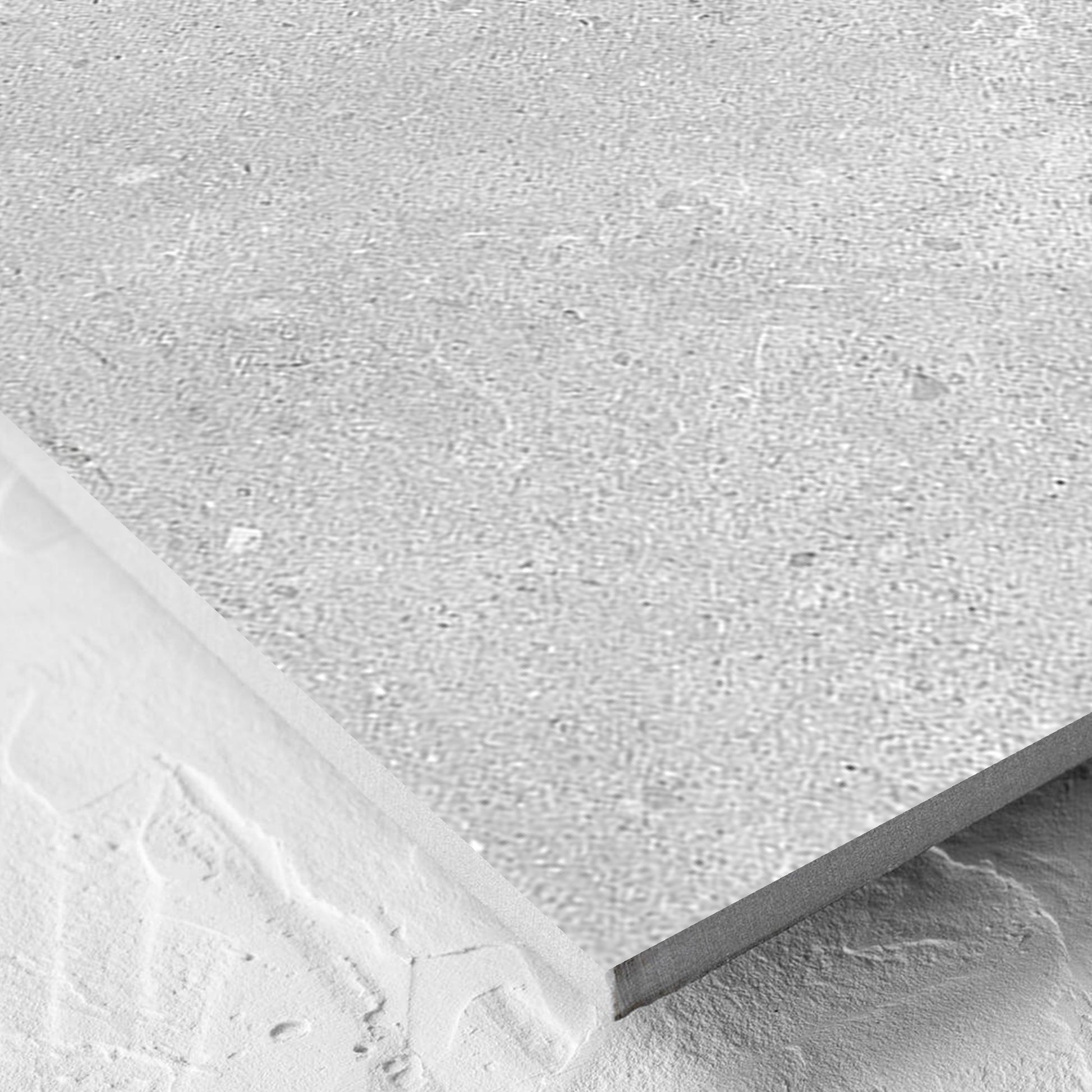 Corner close-up of the Paradigm Light Grey Structured Paver 600x600x20mm tile showing the tile surface and the edge profile