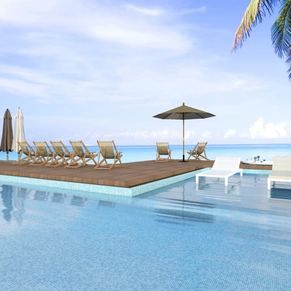 Paradise Tahiti Glass Mosaic Pool Safe 300x300mm tiles lining a luxury resort infinity pool with timber deck, lounge chairs, and ocean views beyond.