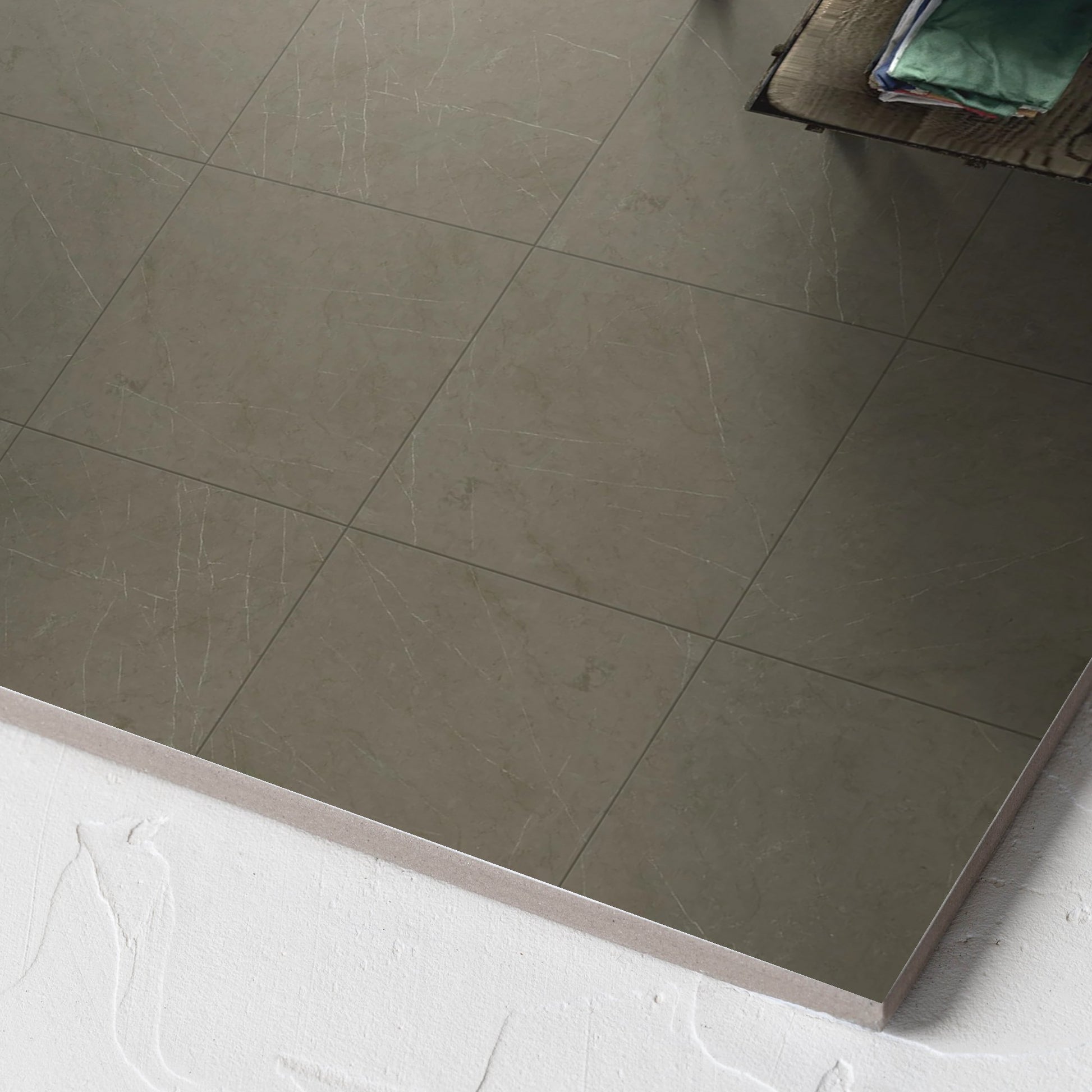 Corner close-up of the Pedra Charcoal Matt 300x300mm tile showing the matt surface and the edge profile