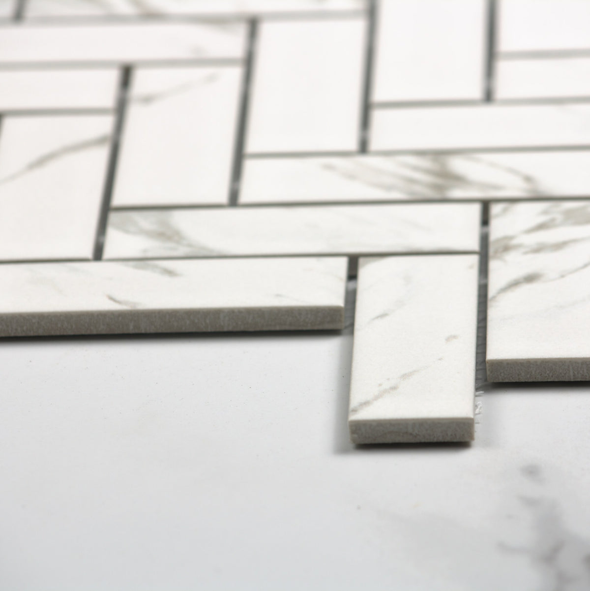 Carrara Look Matt Porcelain Glazed Herringbone Bond 23x73mm angle view