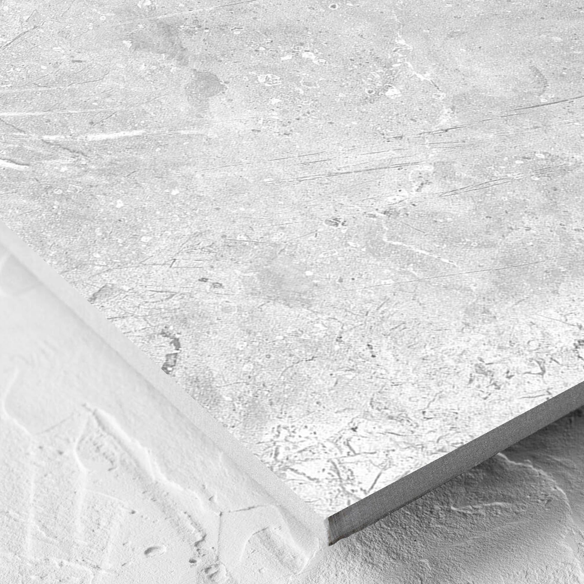 Corner close-up of the Potifino Oyster Polished 600x600mm tile showing the matt surface and the edge profile