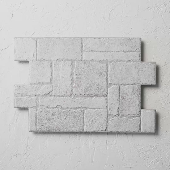 Borgogna White Stonework 440X660Mm tile shown in hand