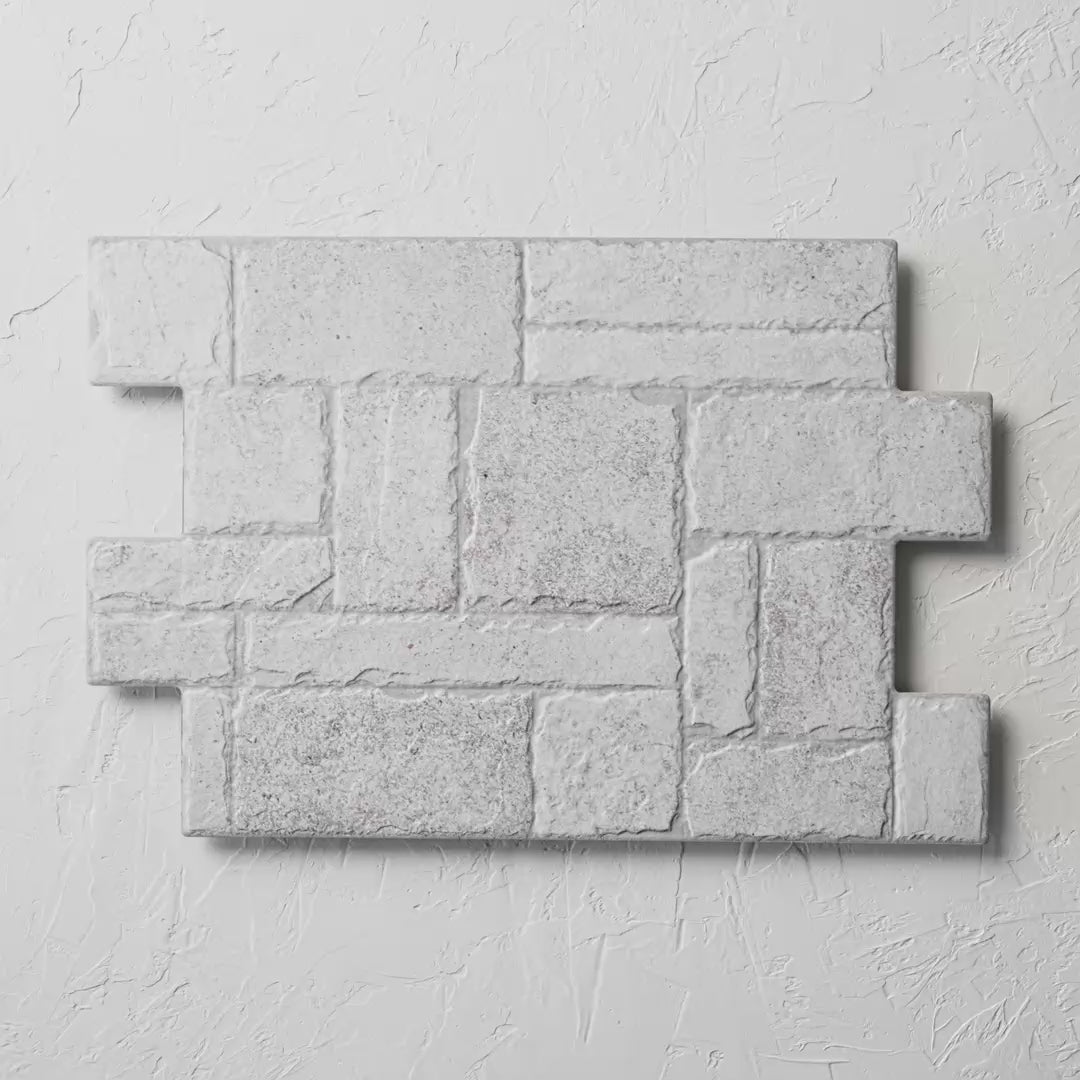 Borgogna White Stonework 440X660Mm tile shown in hand