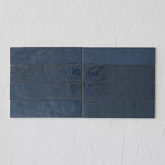 Bricks Night Glossy Bricks Night Glossy 60X246 tile shown in hand