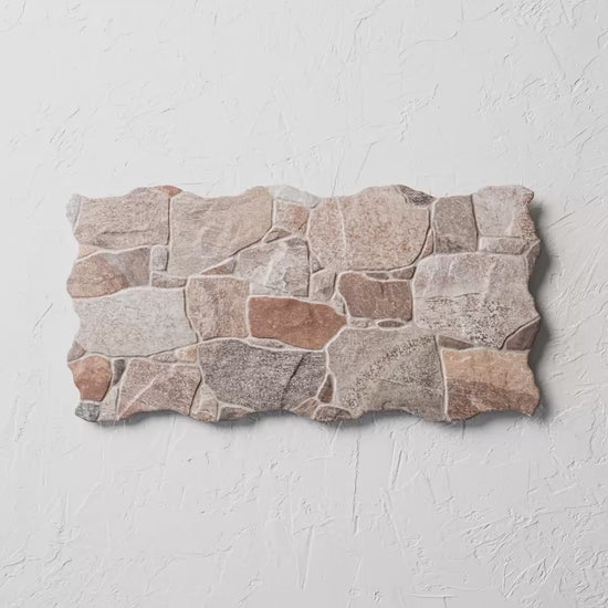 Driverstone Misto 300X600Mm tile shown in hand