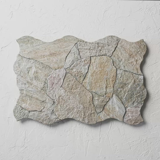 Deva Beige 440X660Mm tile shown in hand
