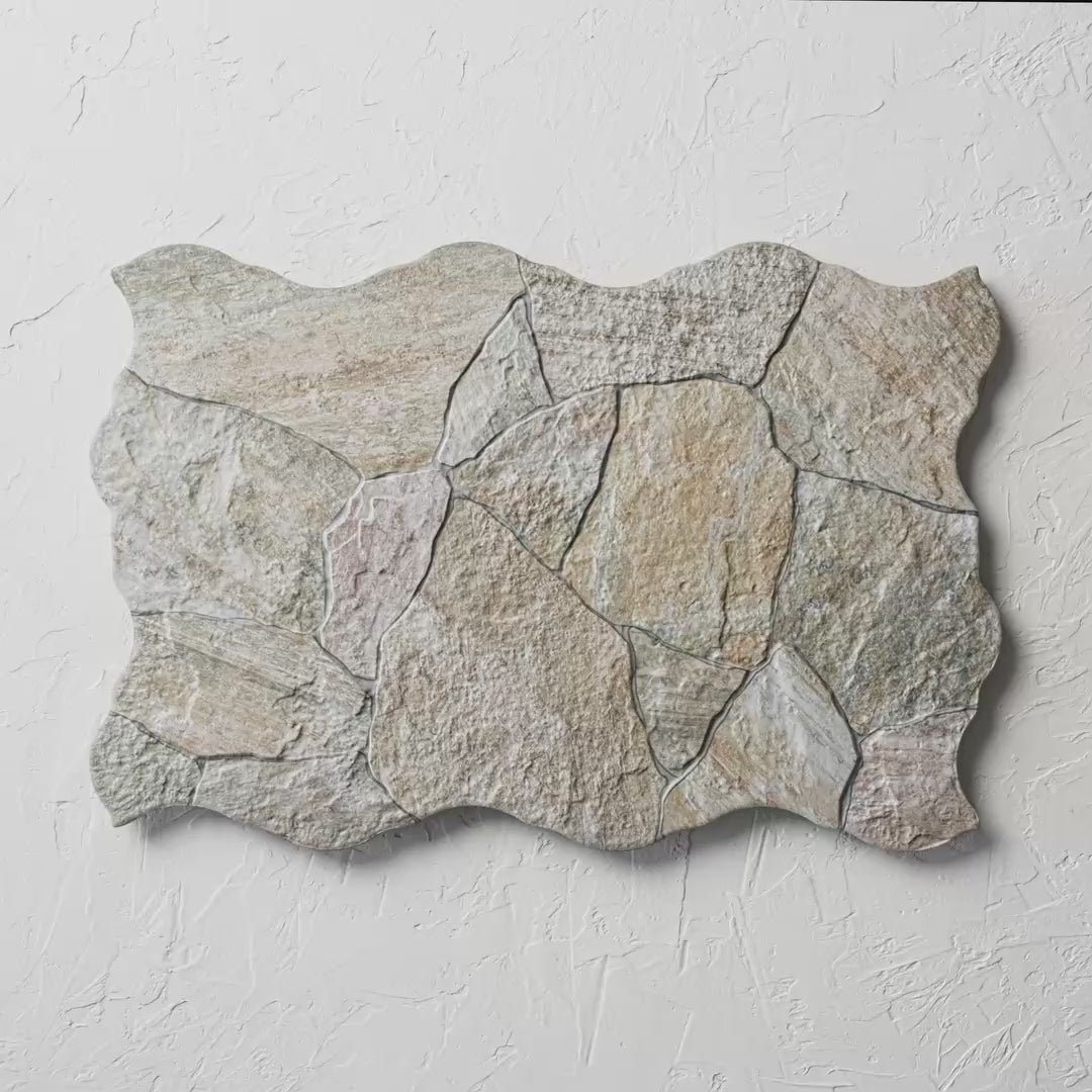 Deva Beige 440X660Mm tile shown in hand