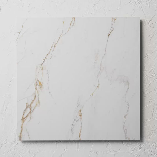 Calacatta Vagli Matt 600X600Mm 1 tile shown in hand