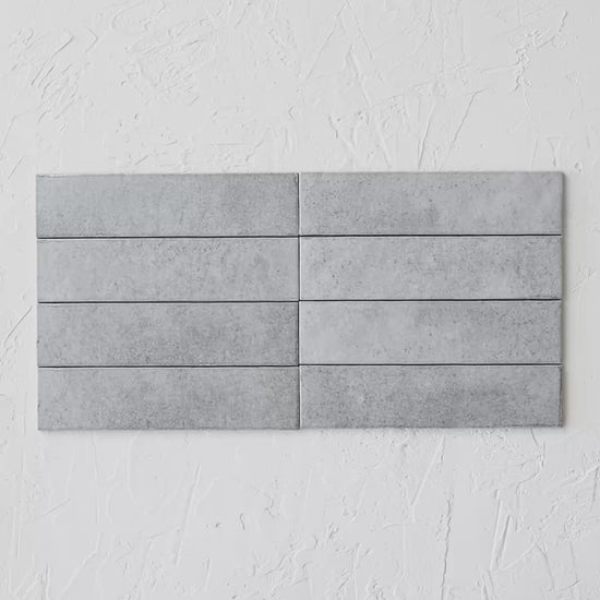 Brick Grey 60X246Mm tile shown in hand