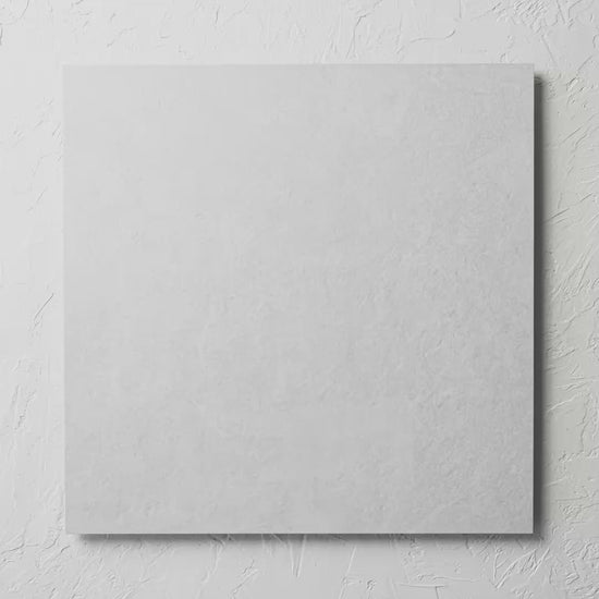 Lava White 600X600Mm tile shown in hand