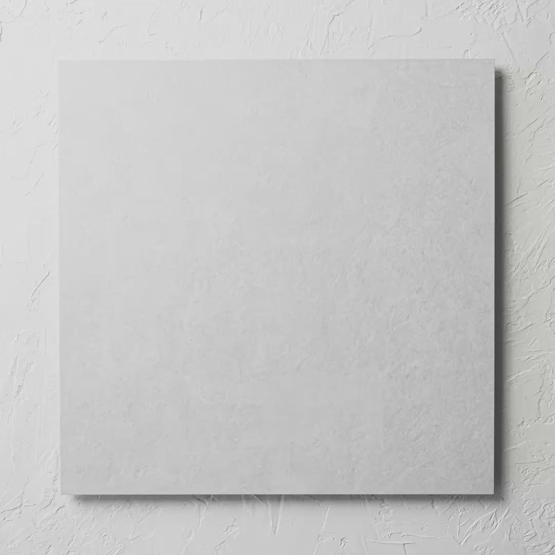 Lava White 600X600Mm tile shown in hand
