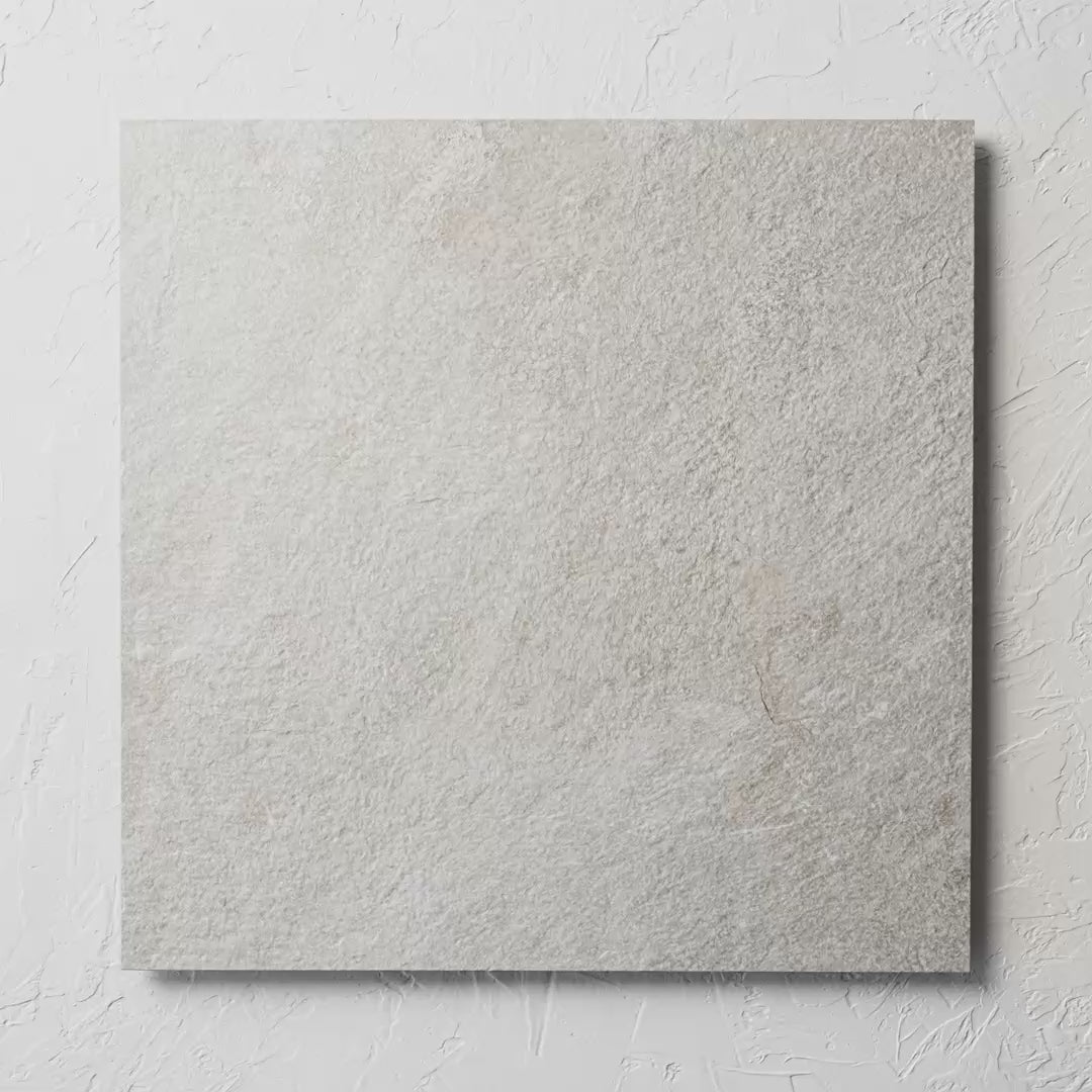 Absolute Moon 600X600Mm tile shown in hand