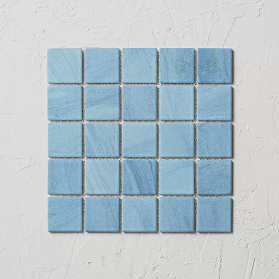 Carrera Aqua Mosaic Sheet 303X303Mm tile shown in hand