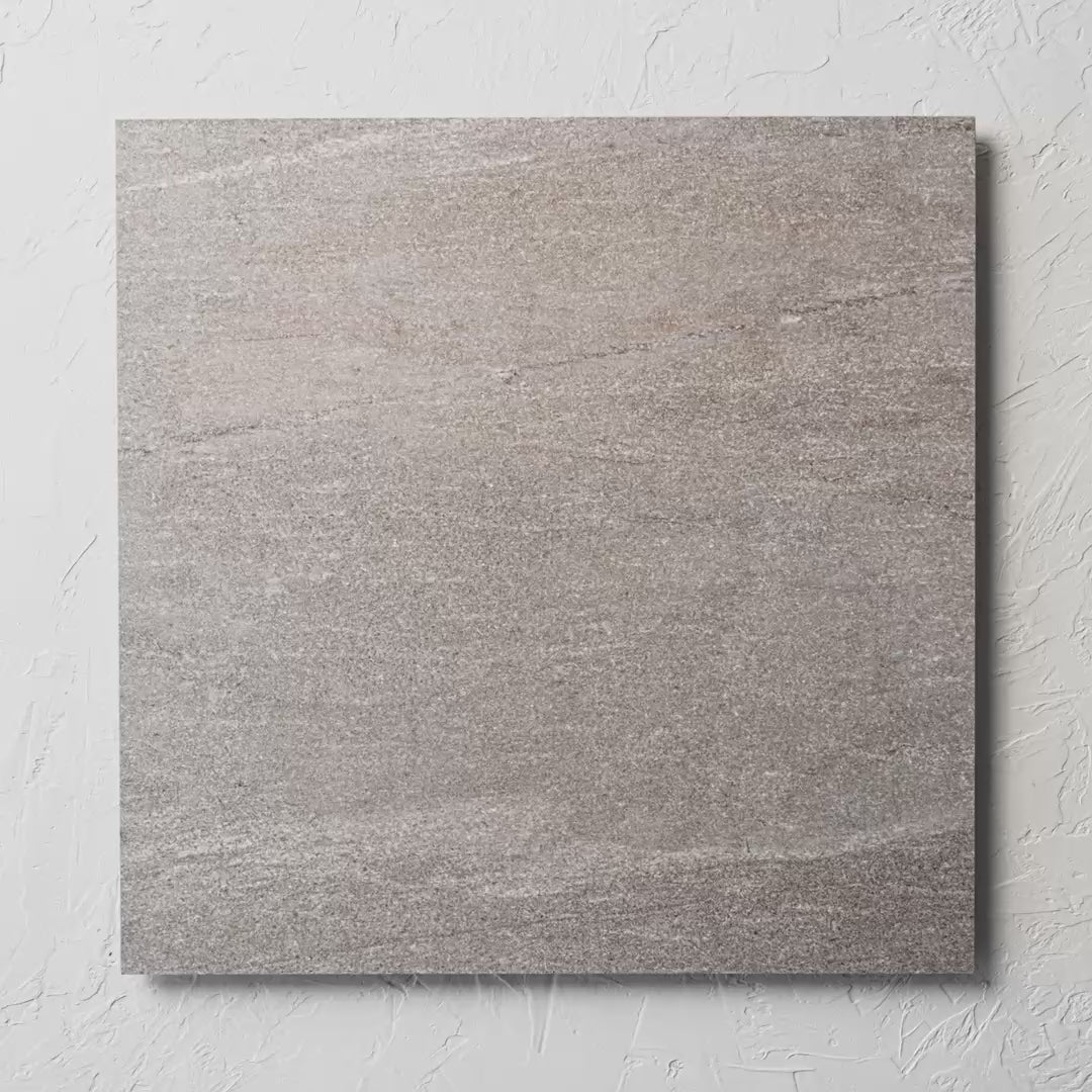 Sparkle Taupe 600X600Mm tile shown in hand