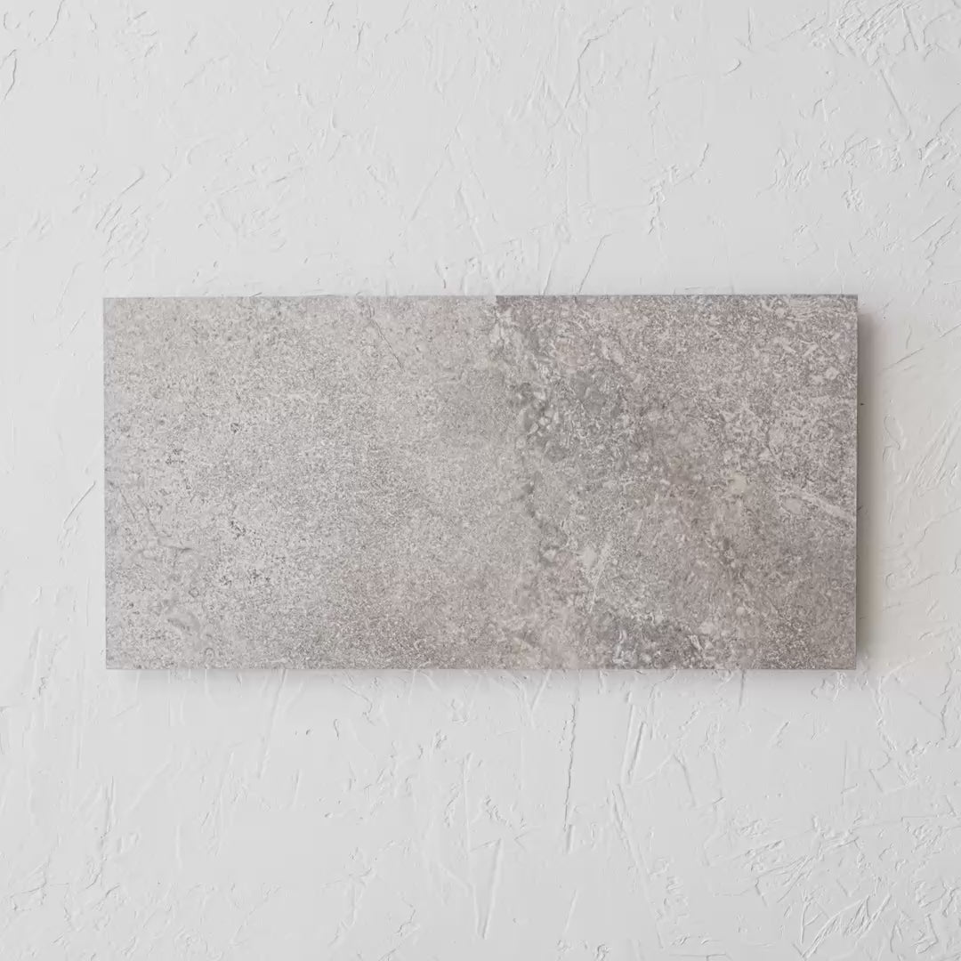 Mars Beige Rectified In Out 300X600Mm tile shown in hand