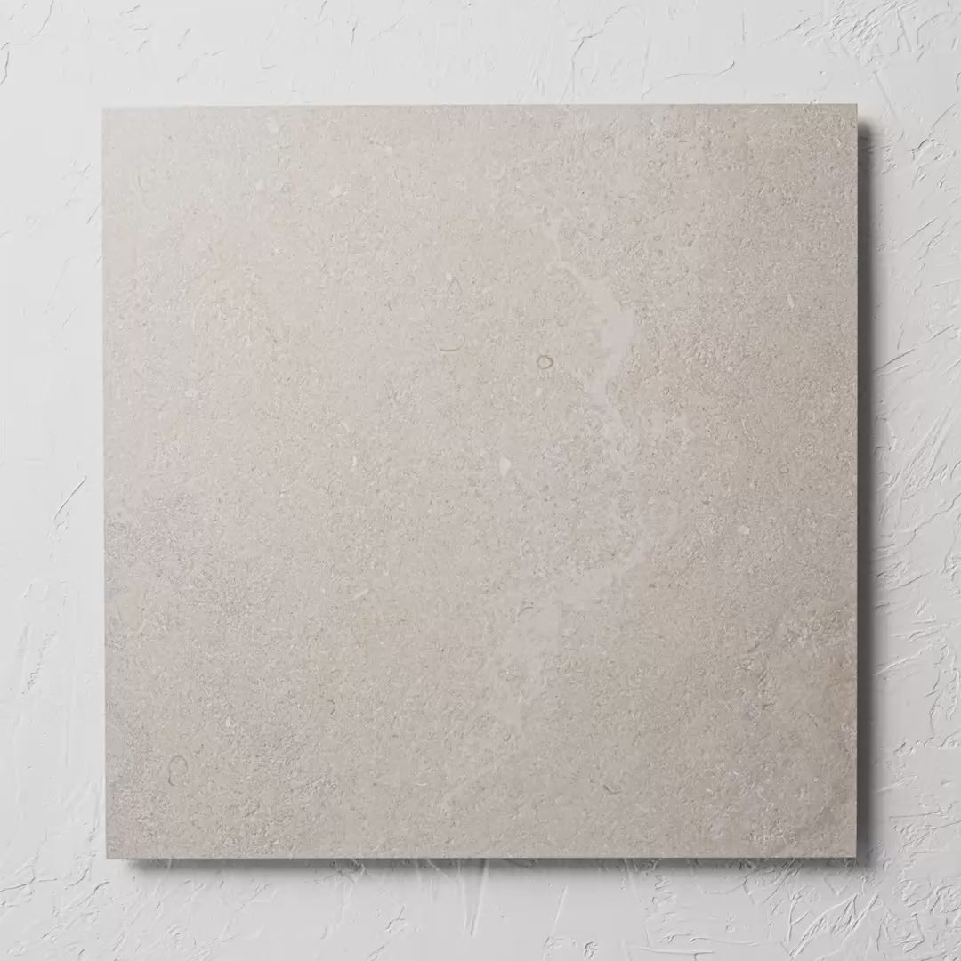 Provence Nature Lapatto Rectified 600X600Mm tile shown in hand