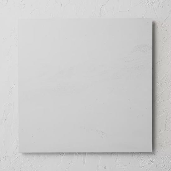 Argyle Stone Talco Rectifed 600X600Mm tile shown in hand