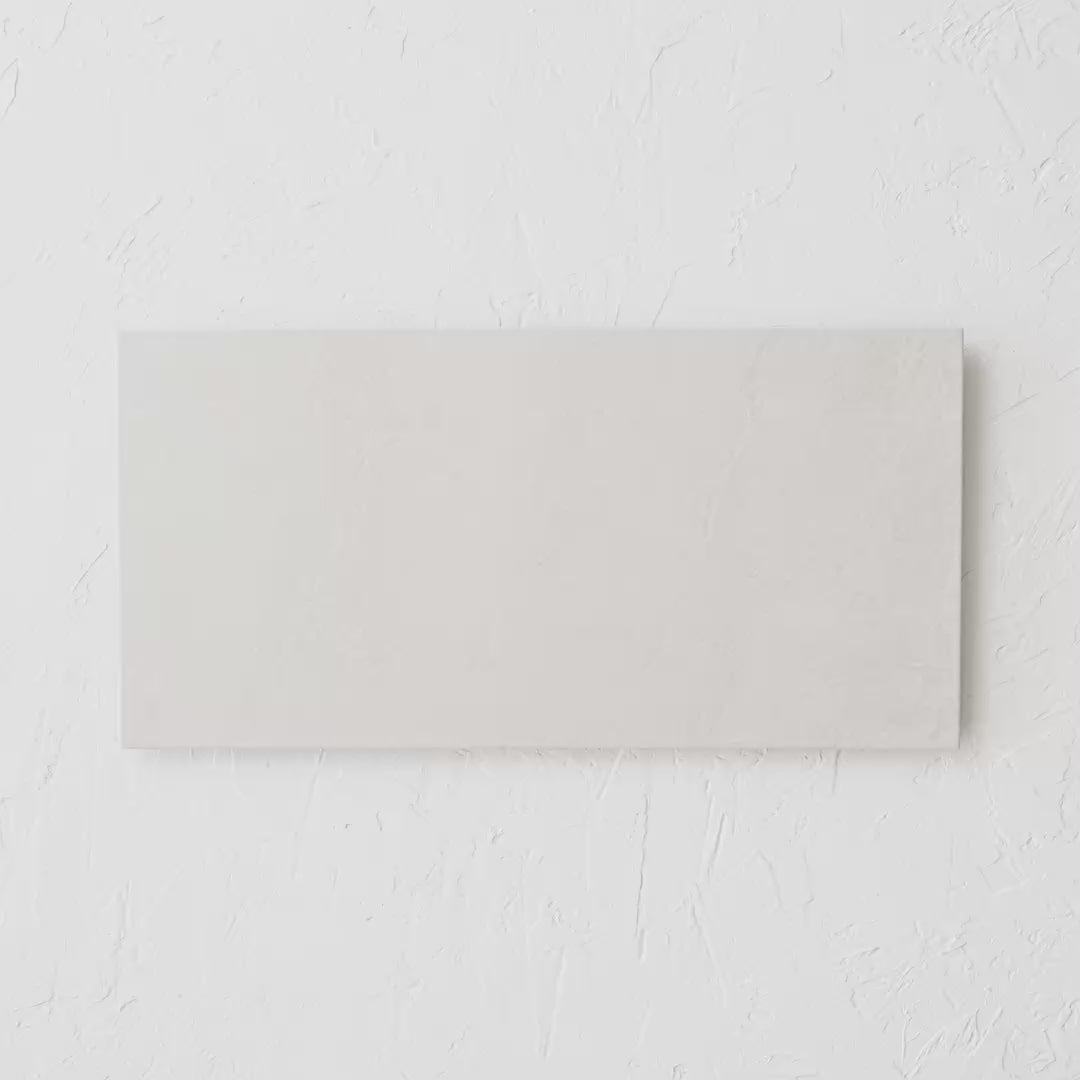 Dolomite Sand 300X600Mm tile shown in hand