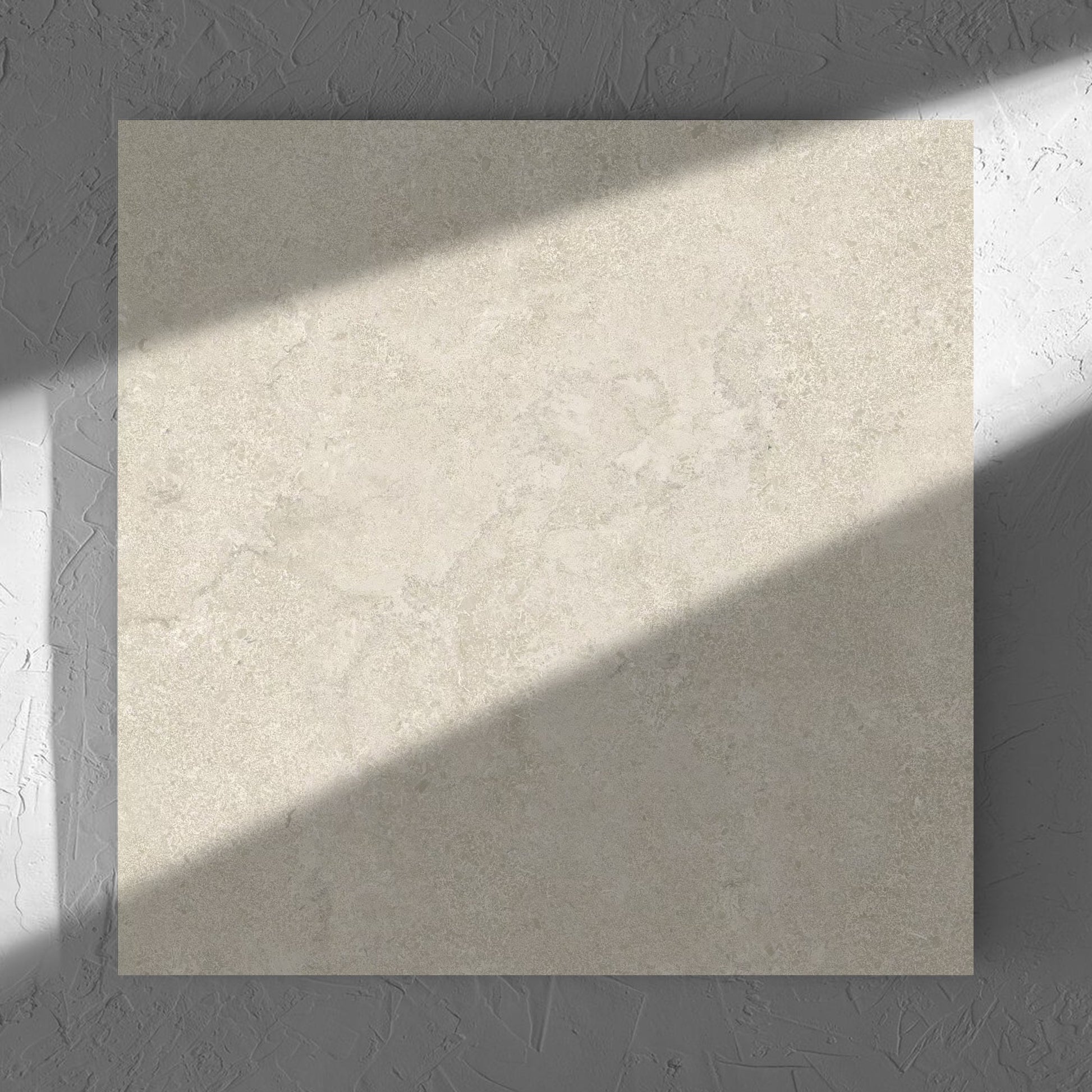 Roman Travertine Beige 600x600mm tile in soft natural window light, showing the beige matt surface