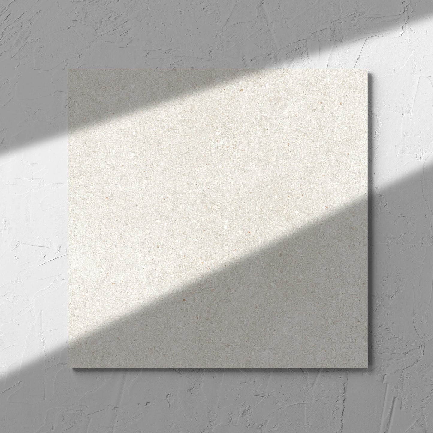 Serenity Beach Sand 300x300mm tile in soft natural window light, showing the matt surface