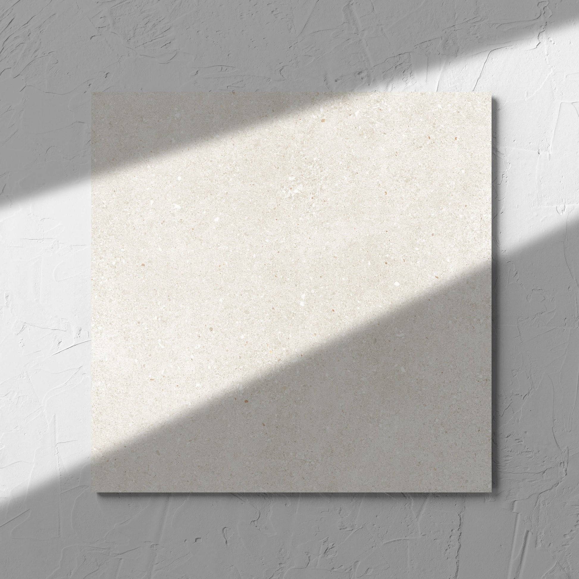 Serenity Beach Sand 300x300mm tile in soft natural window light, showing the matt surface