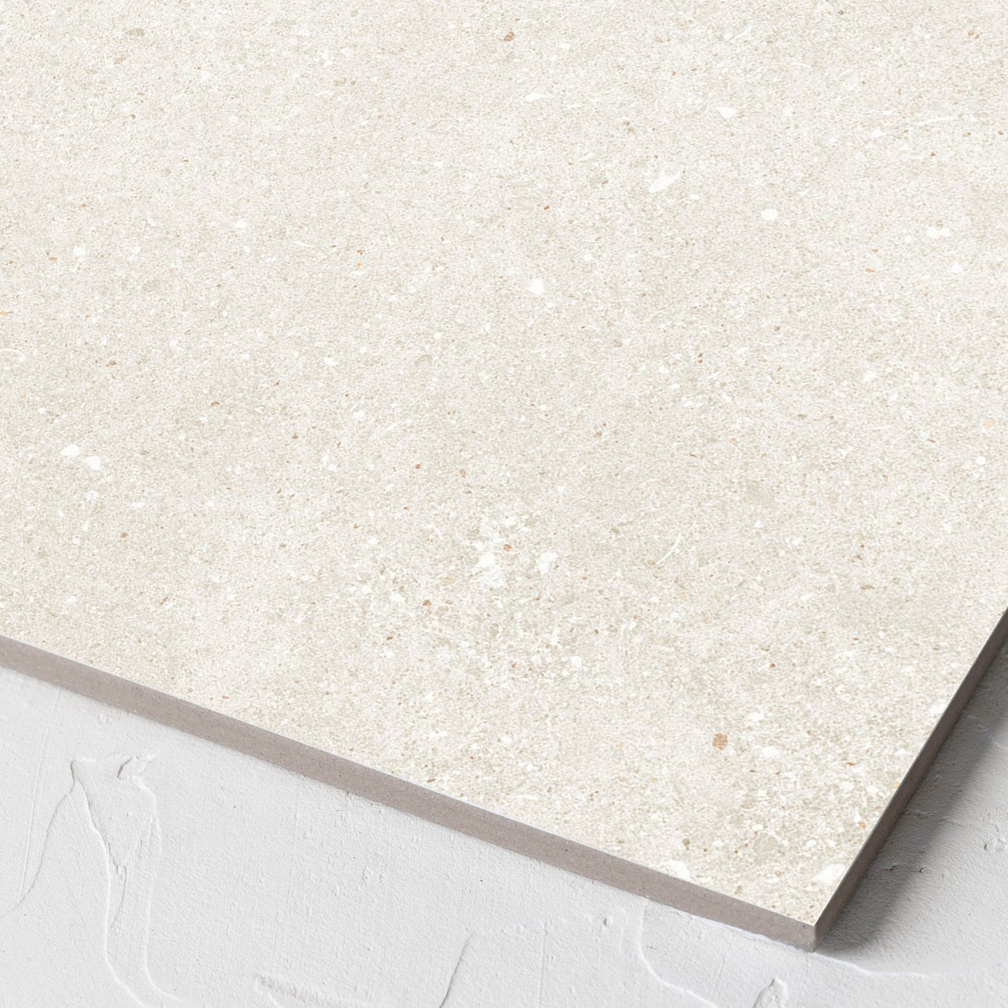 Corner close-up of the Serenity Light Mocha 300x300mm tile showing the matt surface and the edge profile