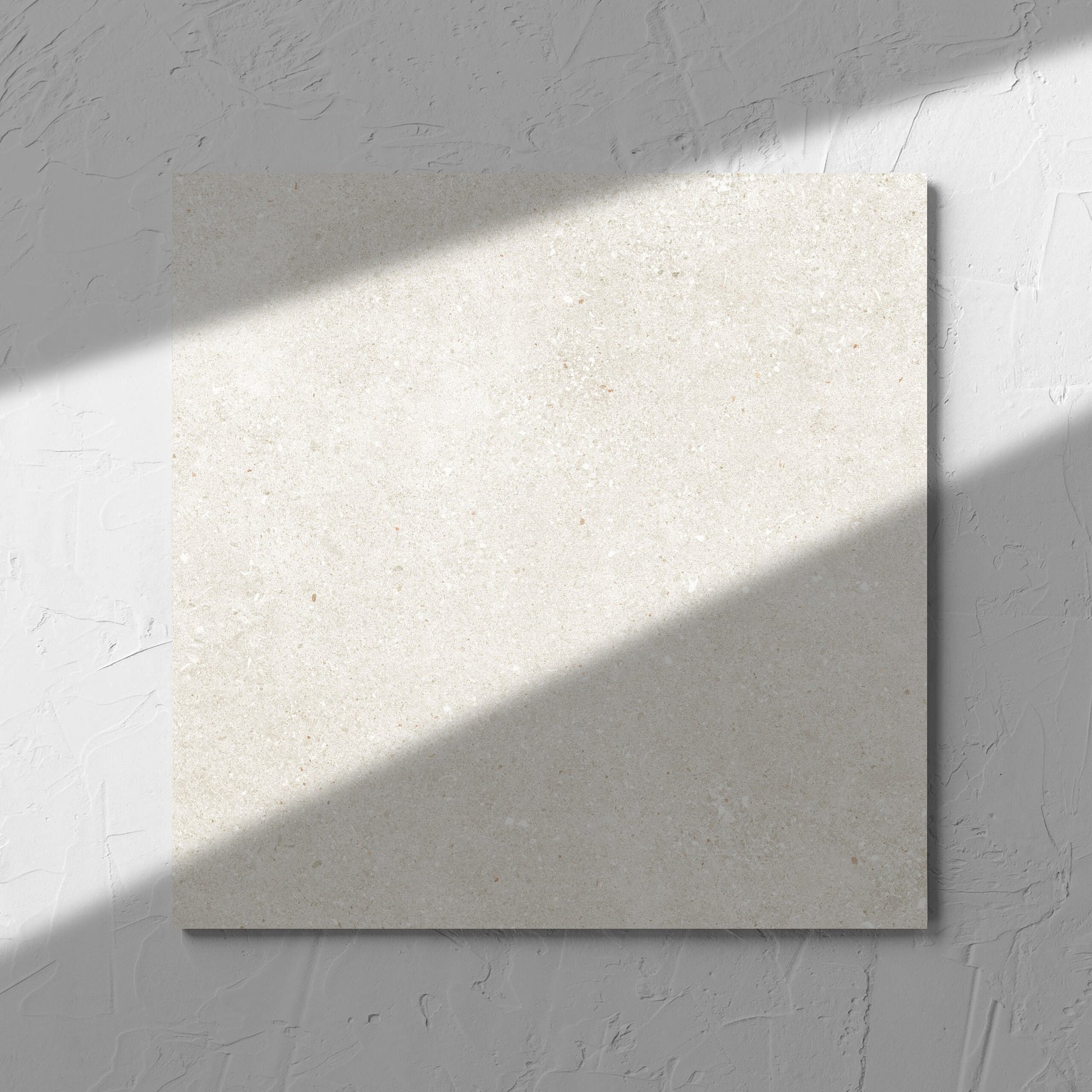 Serenity Light Mocha 300x300mm tile in soft natural window light, showing the matt surface