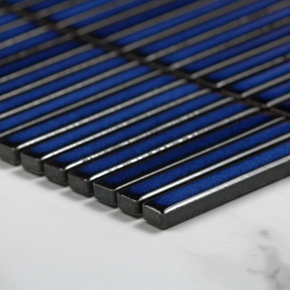Shadow Blue Gloss Porcelain Glazed KitKat 12x92mm angle view