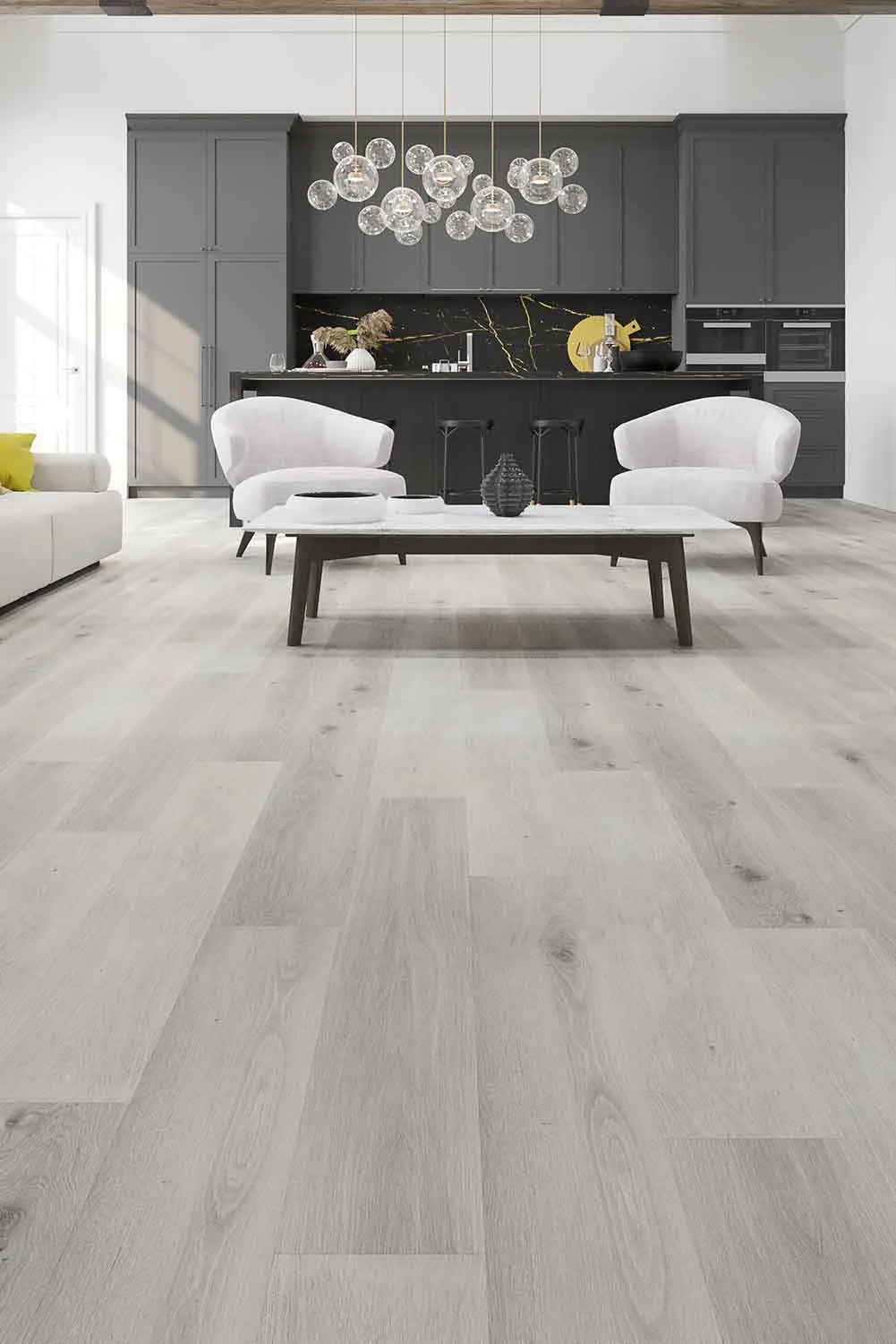 Snow Grey Elegant SPC Hybrid 9.5mm Flooring 7.5+2mm installed in a contemporary open-plan living area featuring white armchairs, marble coffee table, and dark grey kitchen cabinetry with globe pendant lights.